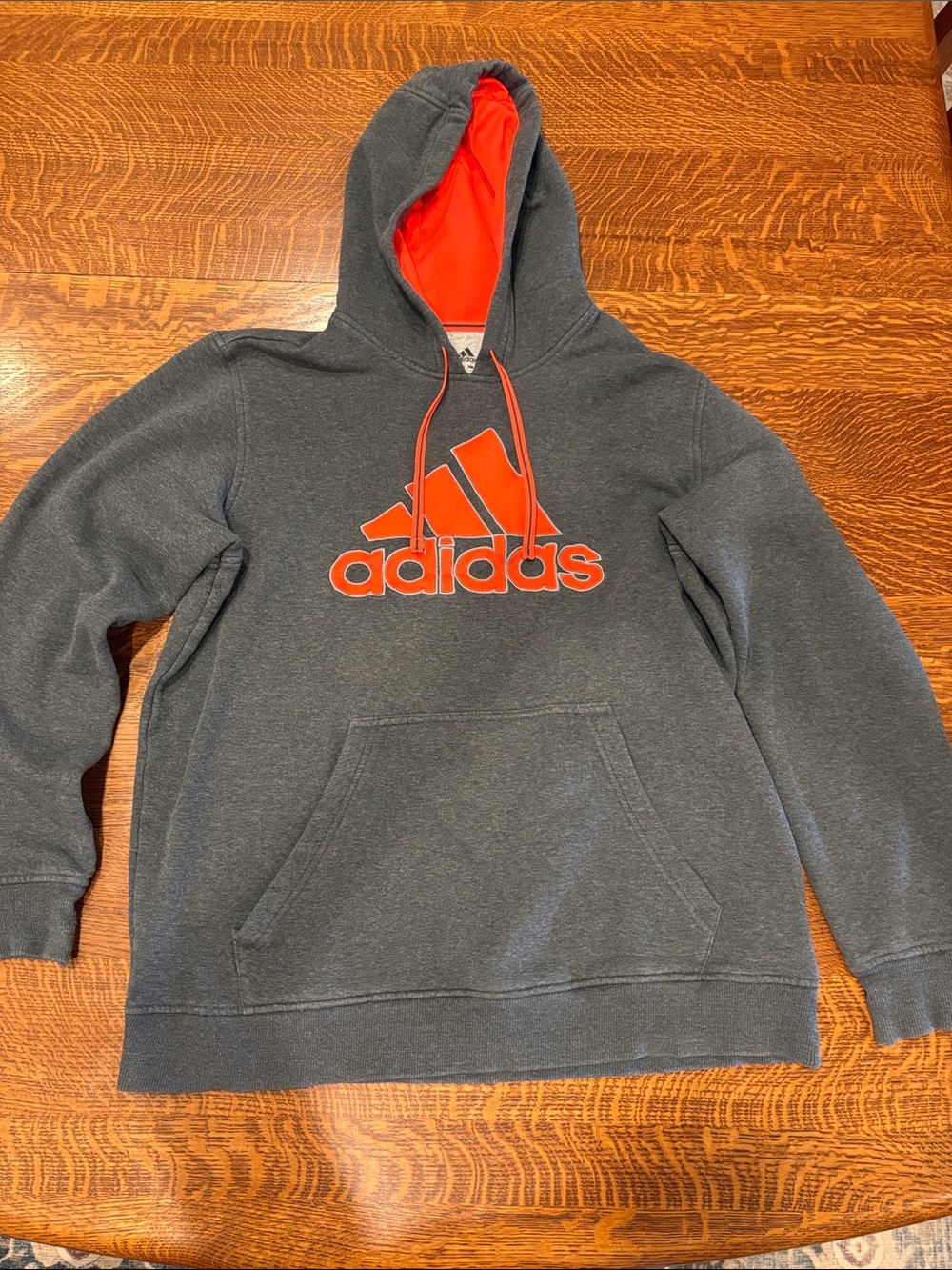 Adidas Charcoal Gray Hoodie with neon Orange Logo & inside hood. Men’s size M/L